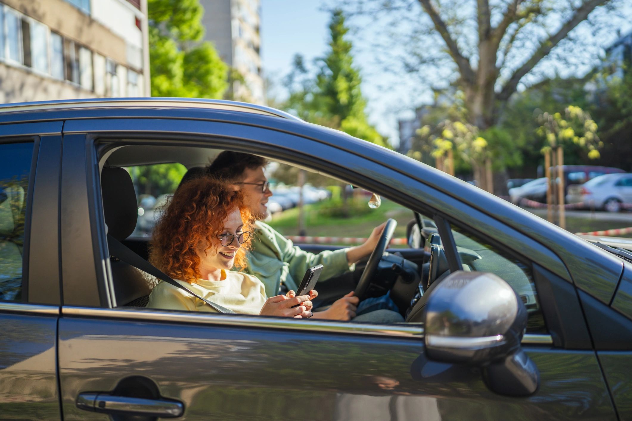 People enjoying a comfortable drive in a modern car